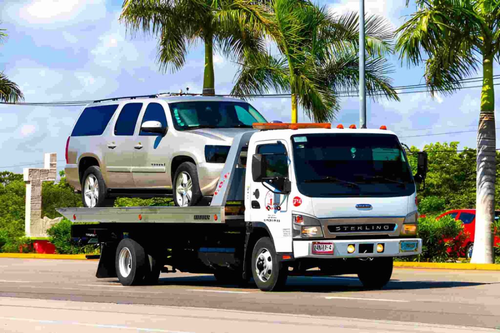 24/7 emergency car recovery service helping a stranded vehicle on the roadside